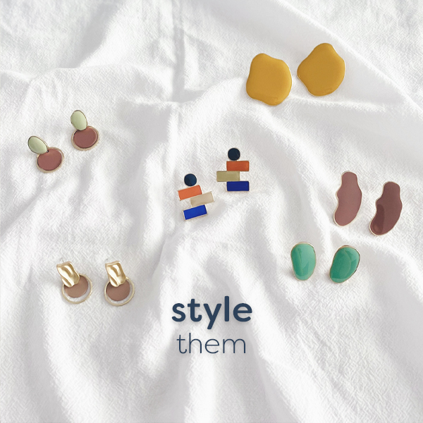 Flat lay of colourful earrings